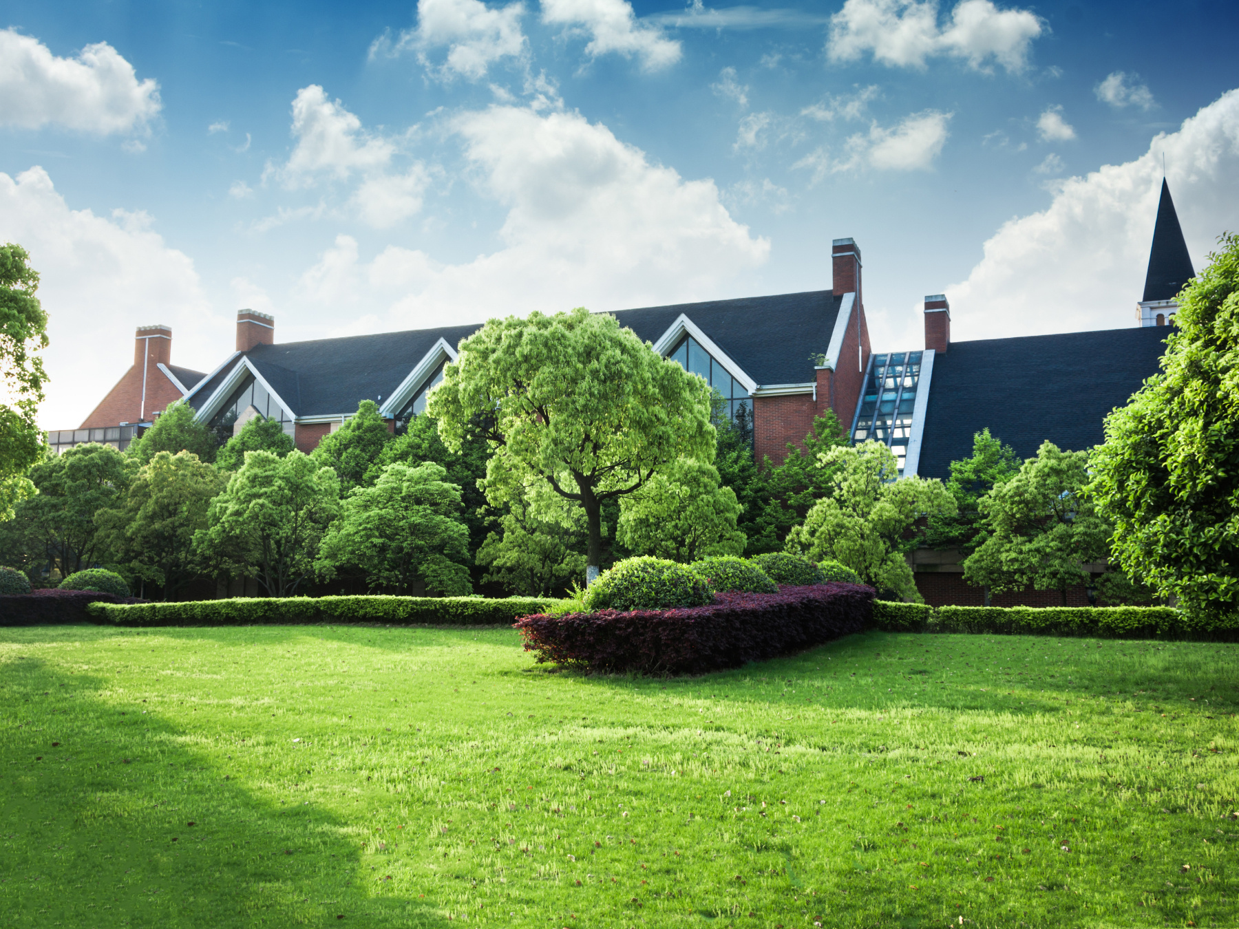 Regularly mowing your lawn and pruning plants is an important factor in keeping your luxury home looking pristine.