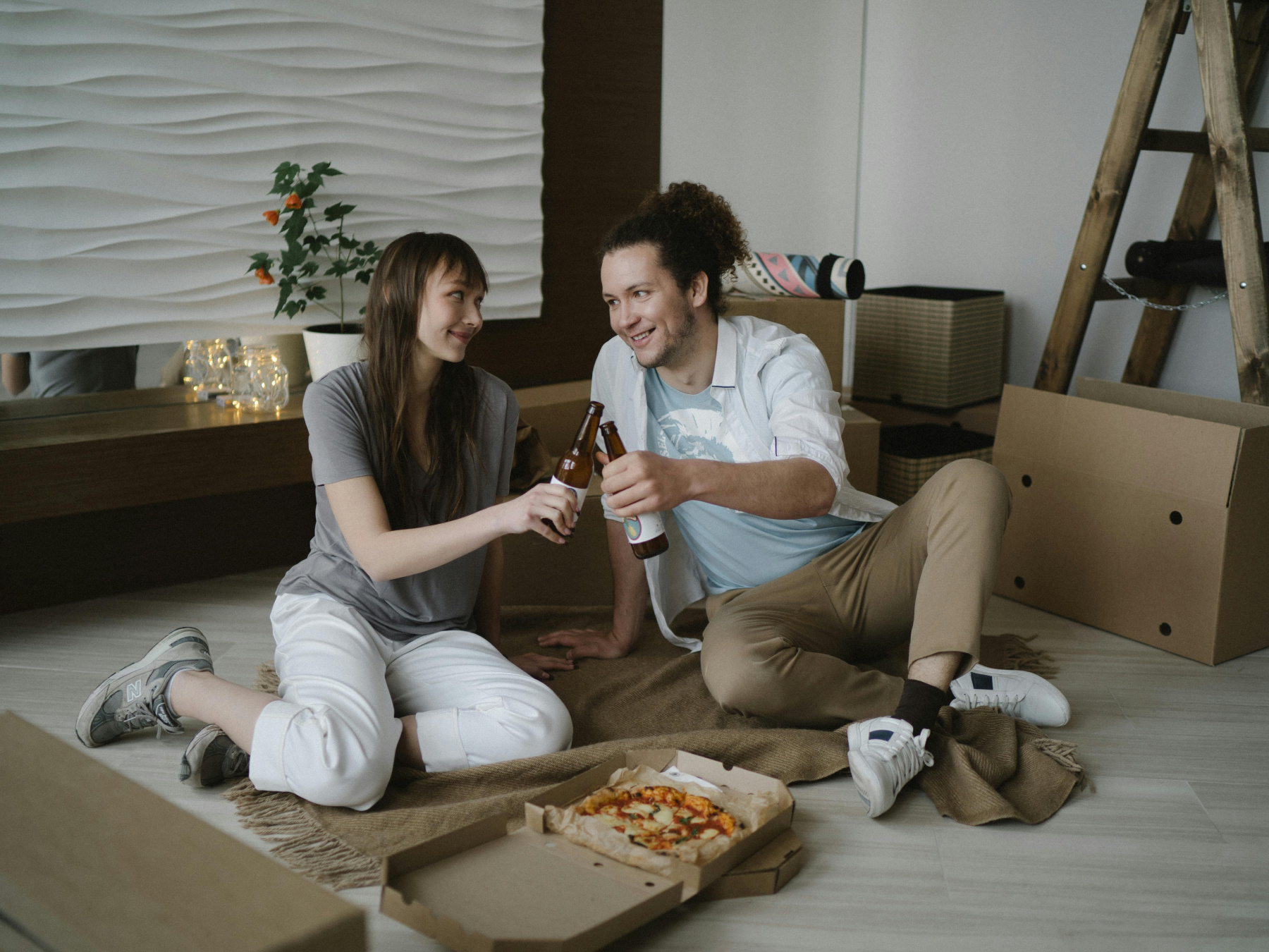 Young couple toast to their new home