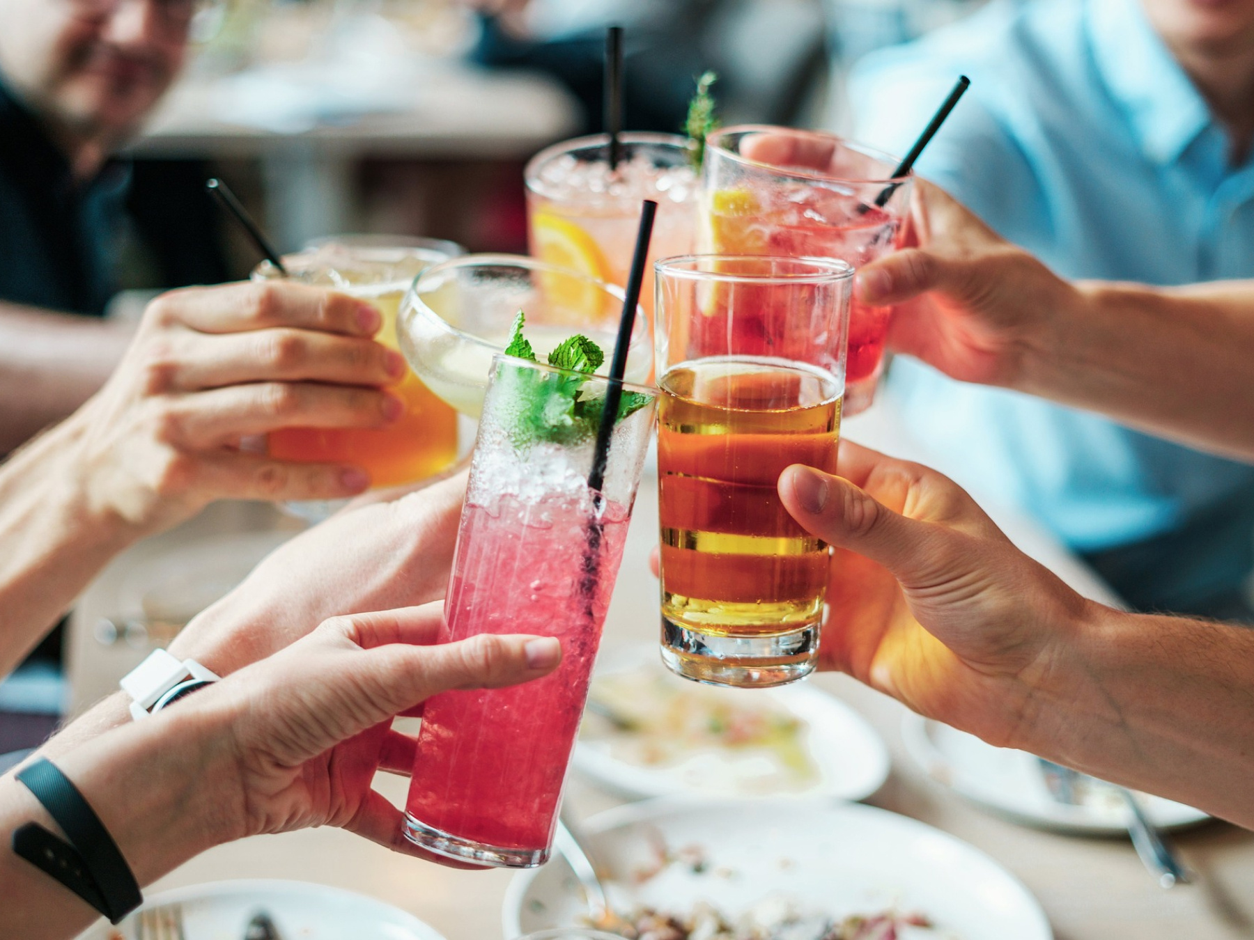 Guests toasting an an outdoor summer party